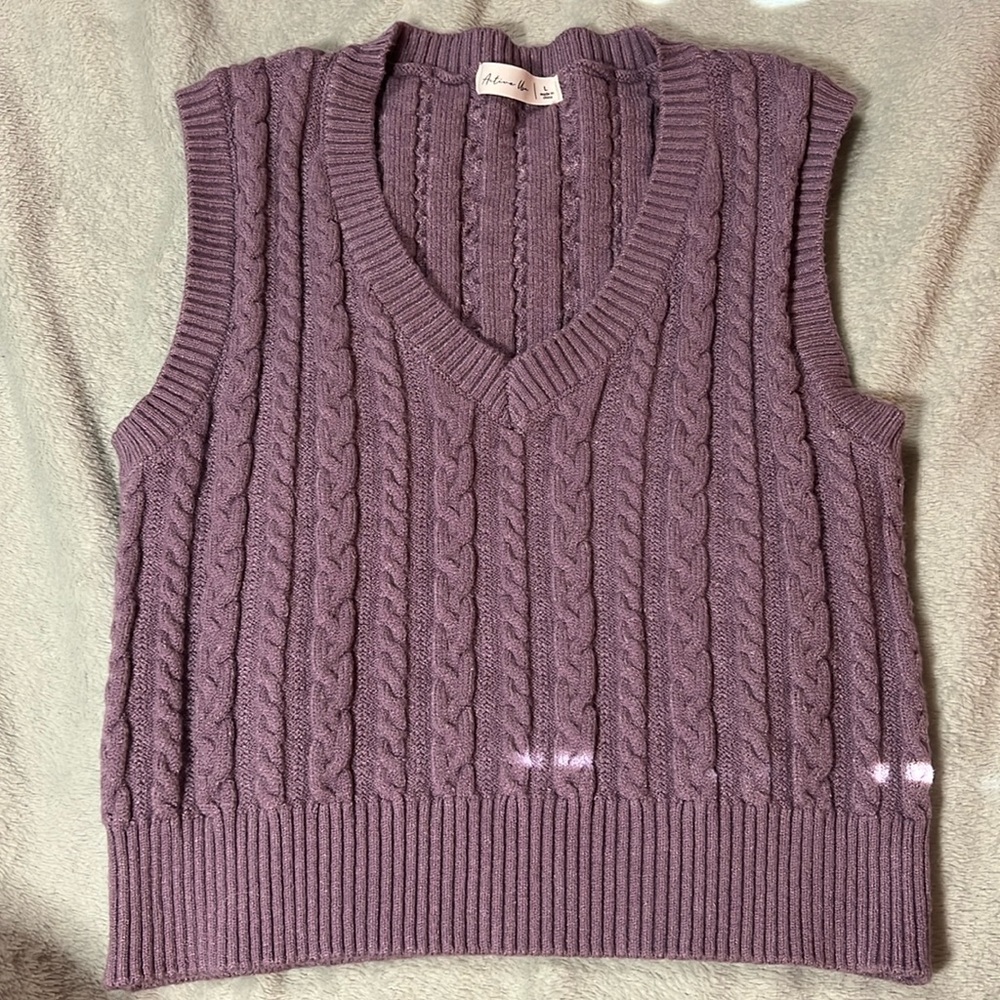 large purple active usage sweater vest